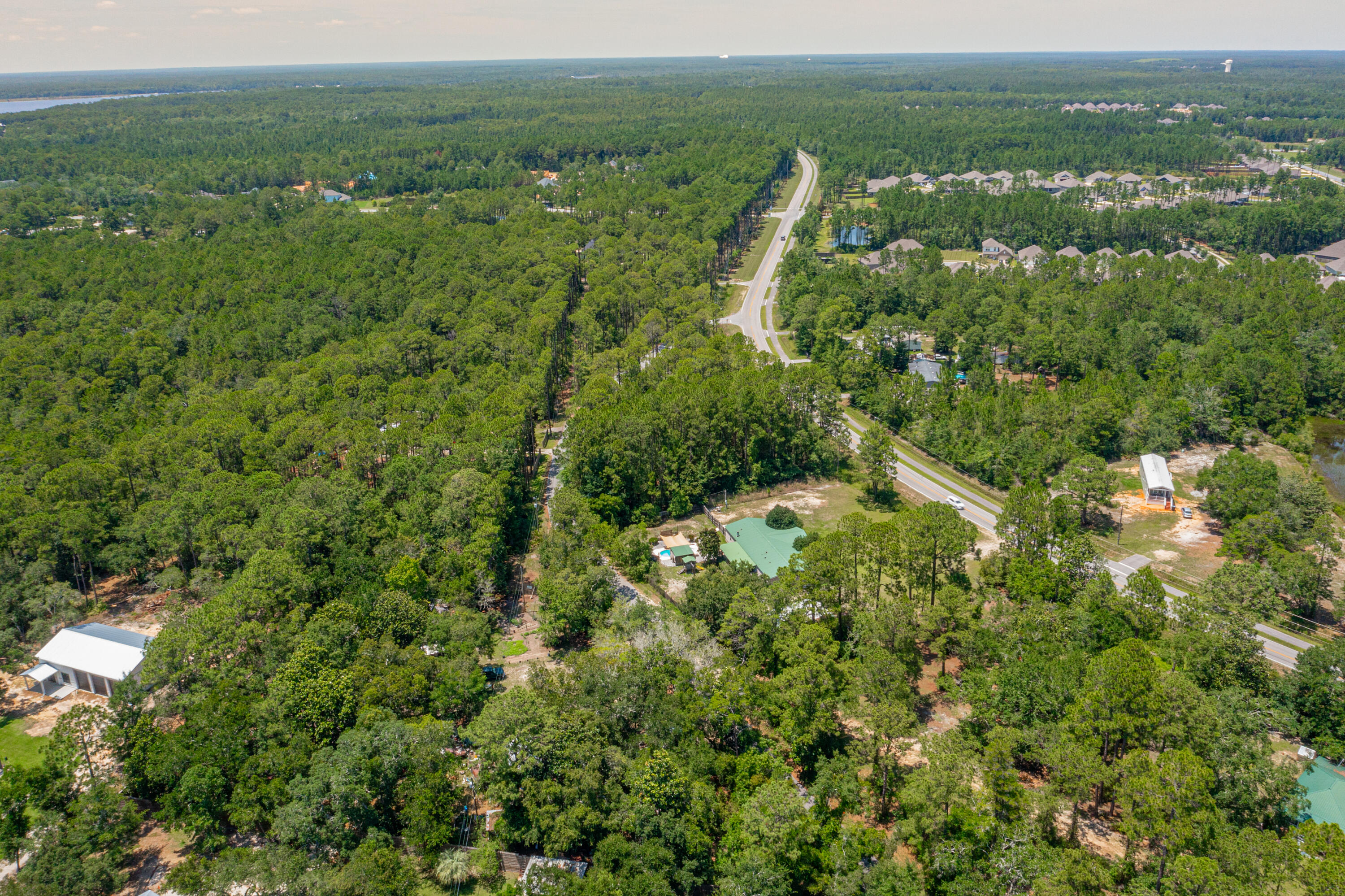 83a Freeport Freeport, FL 32439 - Photo 3 of 16 a view of a city with lush green forest