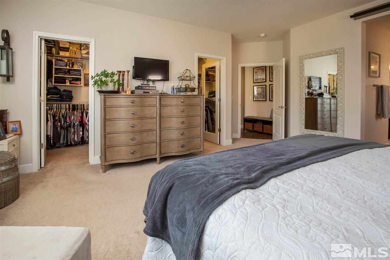 2940 Tobiano Drive Reno, NV 89521 - Photo 12 of 29 a bedroom with a bed and furniture
