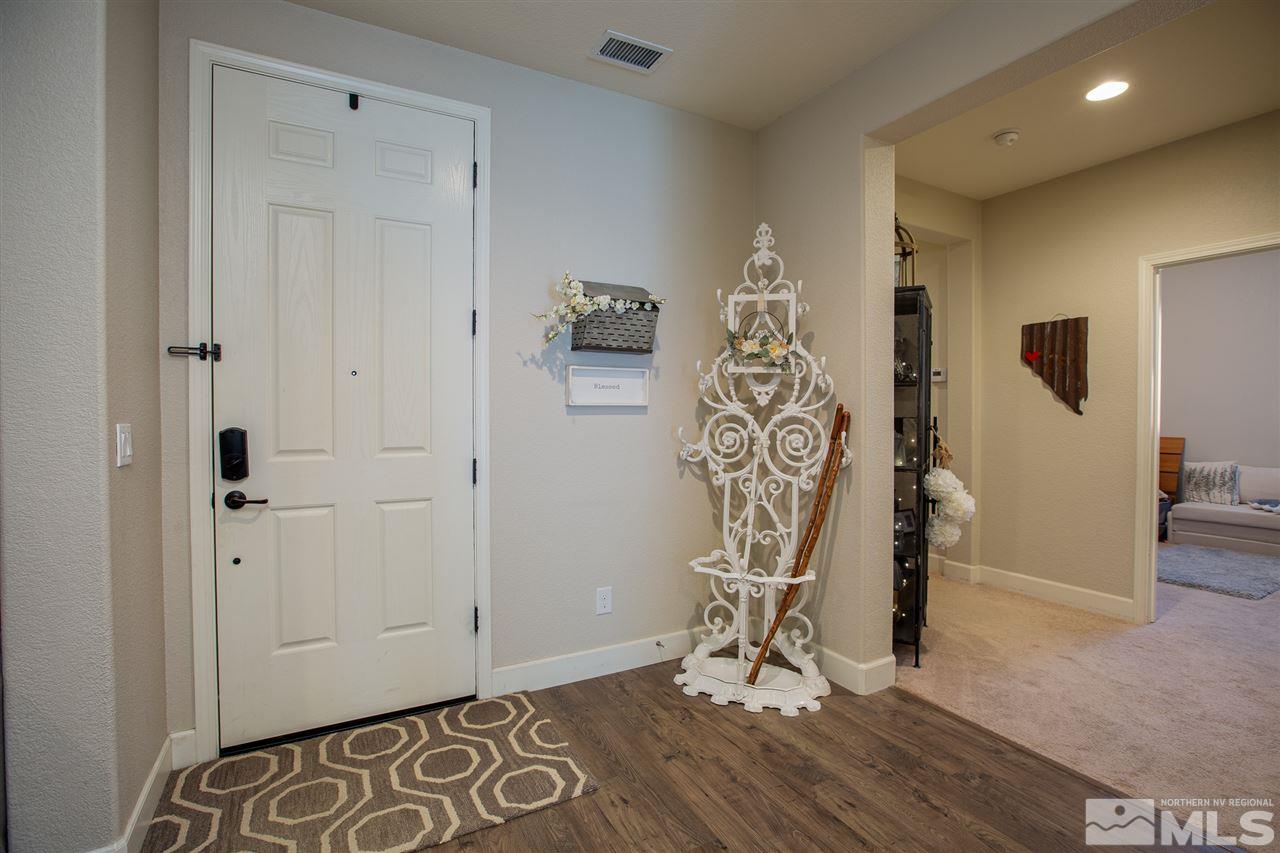 2940 Tobiano Drive Reno, NV 89521 - Photo 16 of 29 a view of an entryway with wooden floor