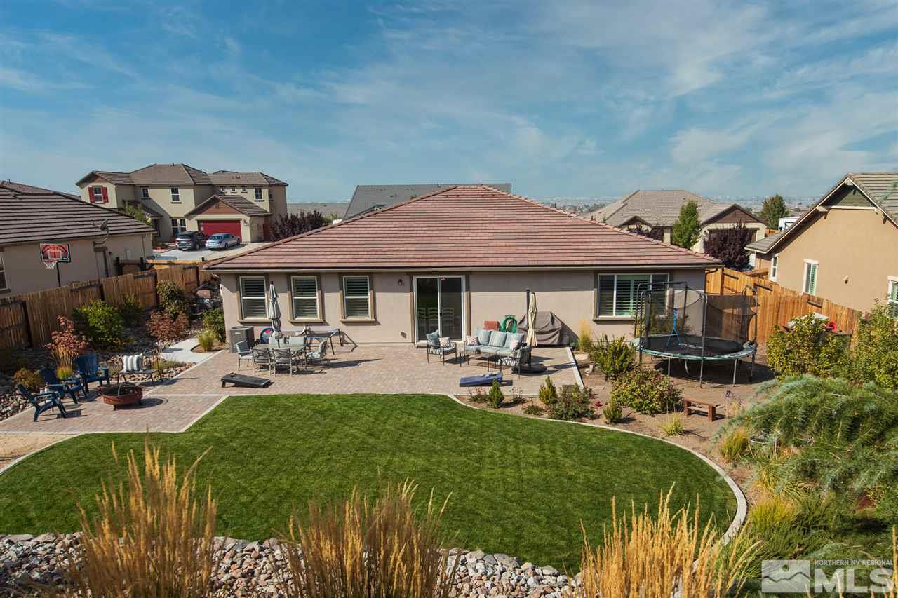 2940 Tobiano Drive Reno, NV 89521 - Photo 18 of 29 a front view of house with yard and outdoor seating