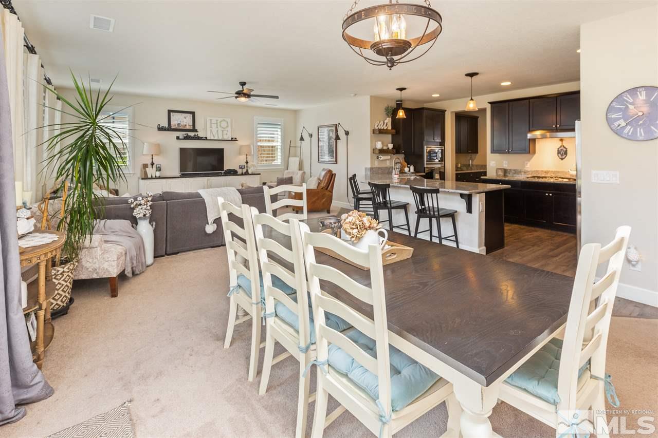 2940 Tobiano Drive Reno, NV 89521 - Photo 2 of 29 a living room with furniture kitchen view and a large window