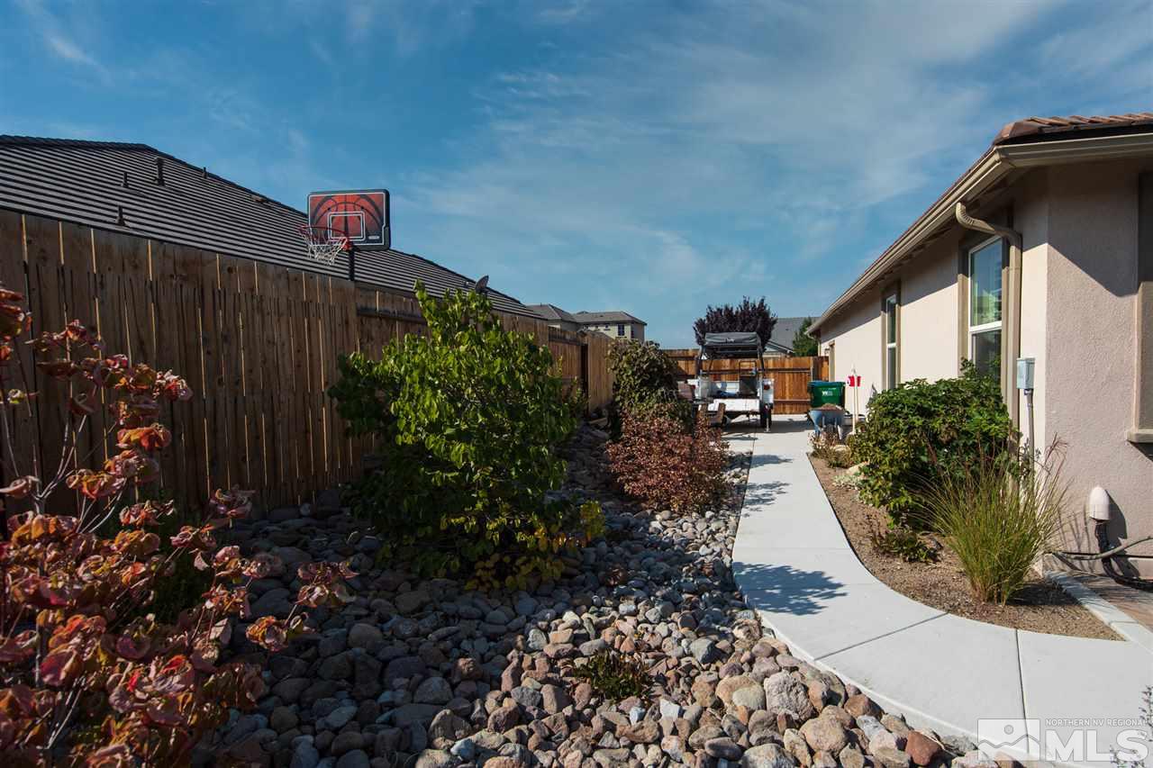 2940 Tobiano Drive Reno, NV 89521 - Photo 28 of 29 a front view of a house with garden