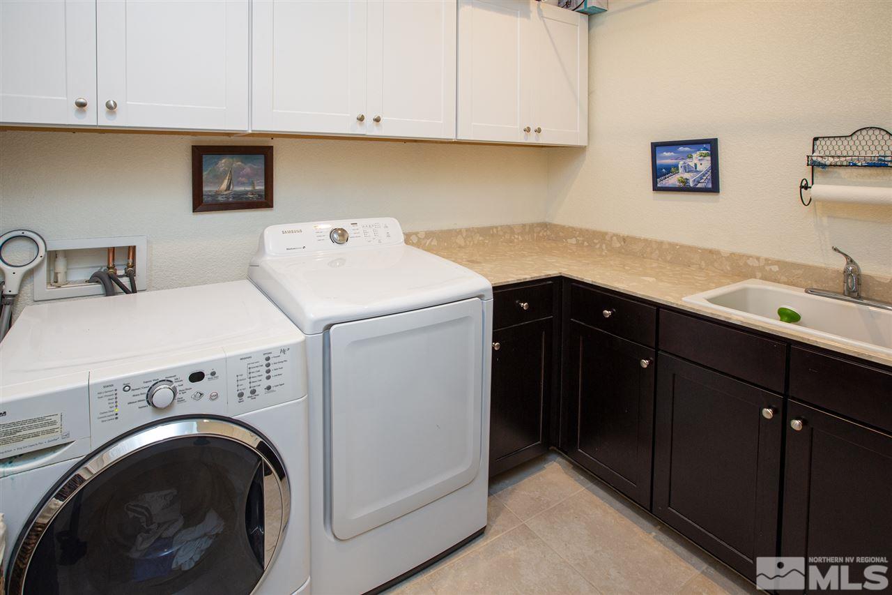 2940 Tobiano Drive Reno, NV 89521 - Photo 10 of 29 a utility room with sink dryer and washer