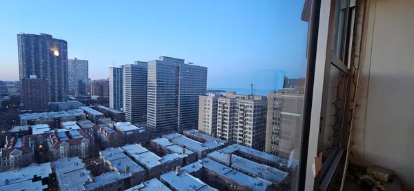 a view of a city with tall buildings