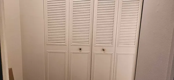 a view of a room with a window