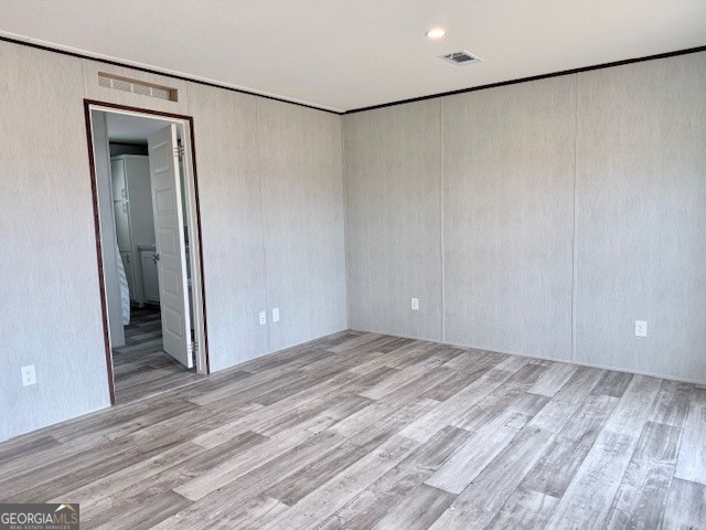 683 Evergreen Church Road Cobbtown, GA 30420 - Photo 12 of 32 a view of a room with wooden floor and a shower