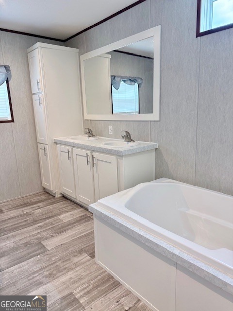 683 Evergreen Church Road Cobbtown, GA 30420 - Photo 13 of 32 a bathroom with a sink and a bathtub