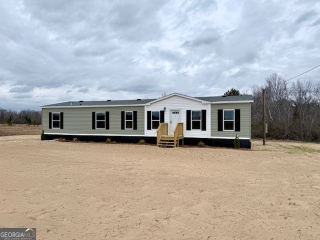 683 Evergreen Church Road Cobbtown, GA 30420 - Photo 25 of 32 a front view of house with yard and trees around