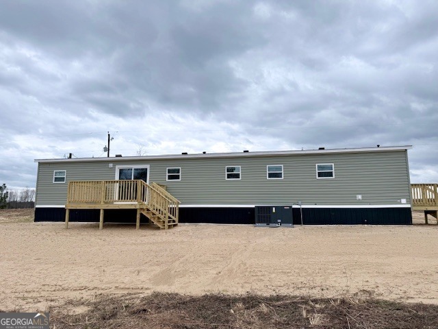 683 Evergreen Church Road Cobbtown, GA 30420 - Photo 31 of 32 a front view of a house with a yard