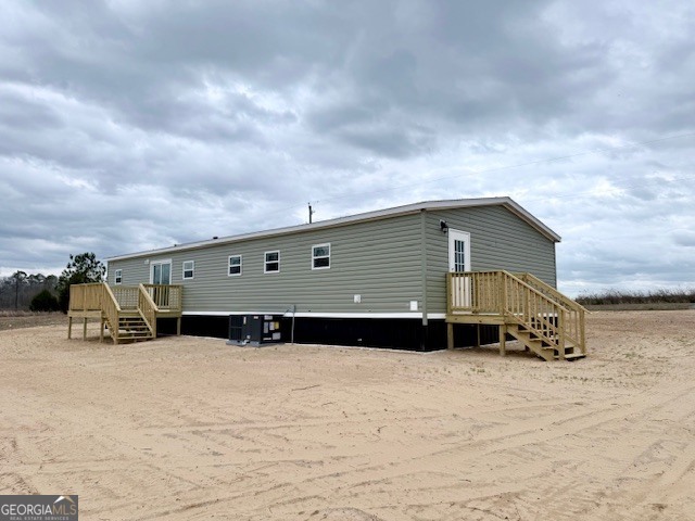 683 Evergreen Church Road Cobbtown, GA 30420 - Photo 32 of 32 a front view of a house with a yard