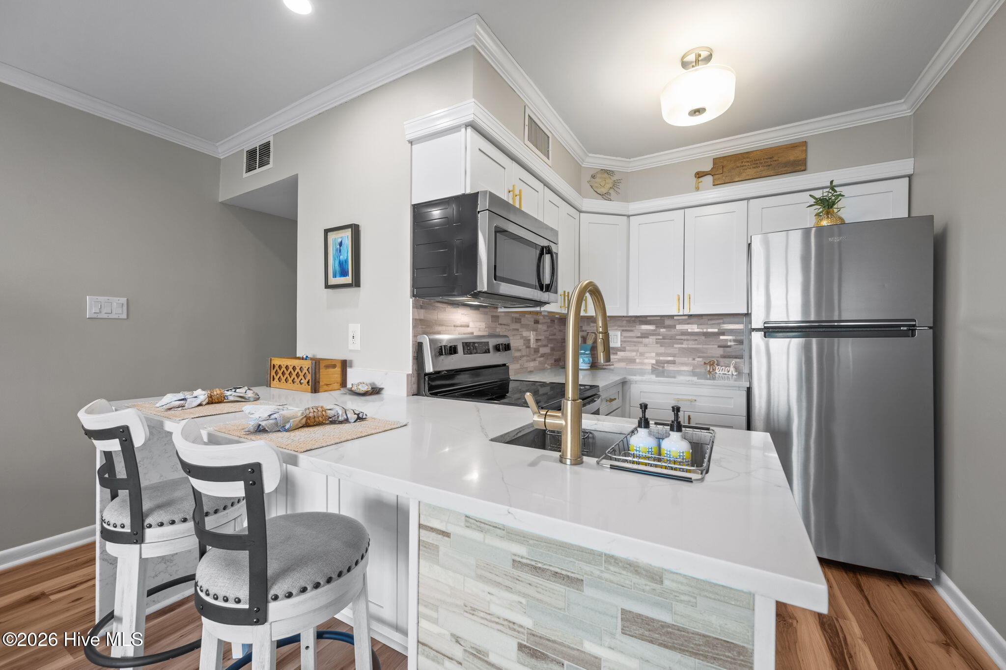 1822 New River Inlet Road, Unit 1102A North Topsail Beach, NC 28460 - Photo 12 of 51 Kitchen