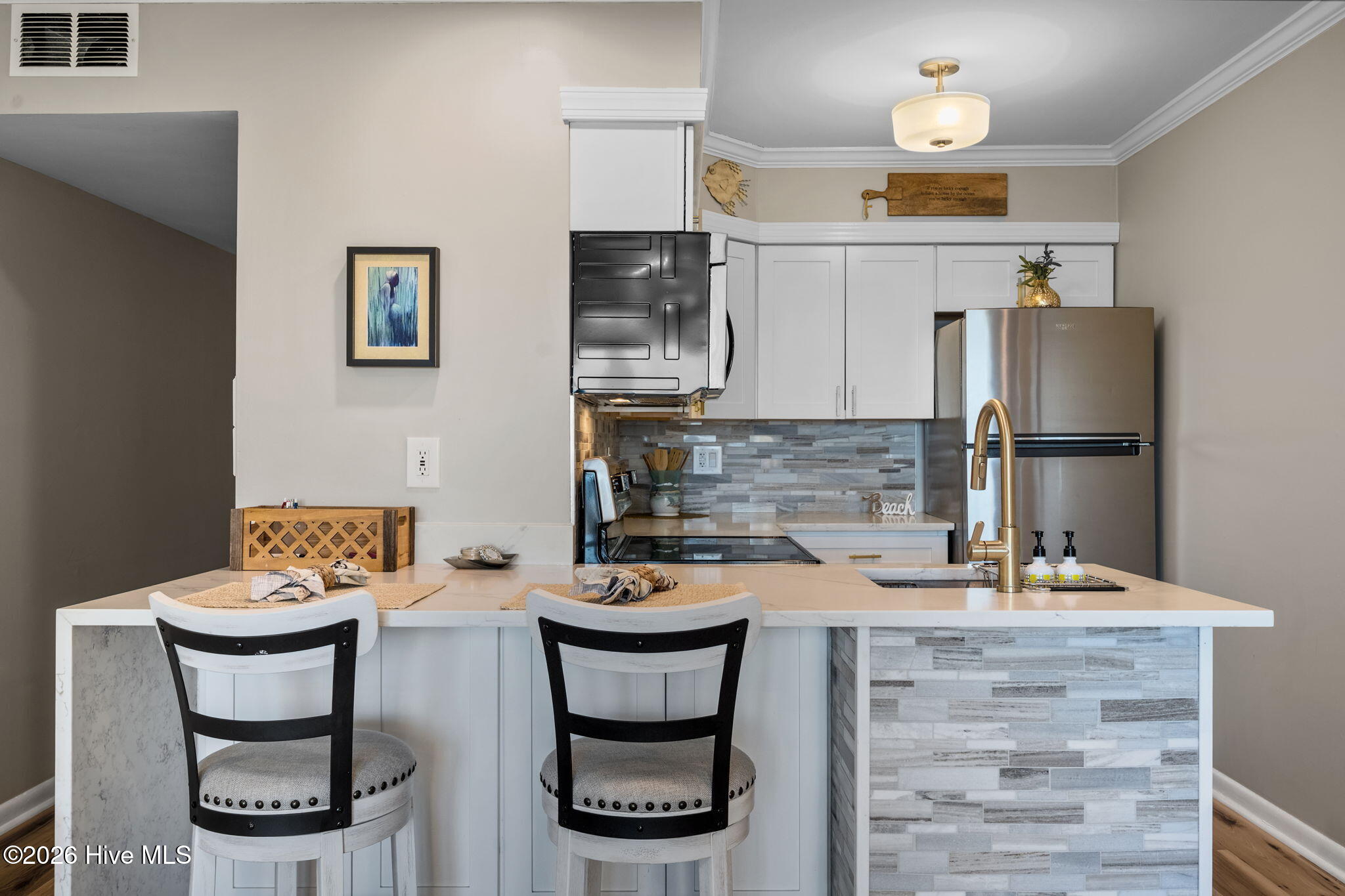 1822 New River Inlet Road, Unit 1102A North Topsail Beach, NC 28460 - Photo 13 of 51 Kitchen