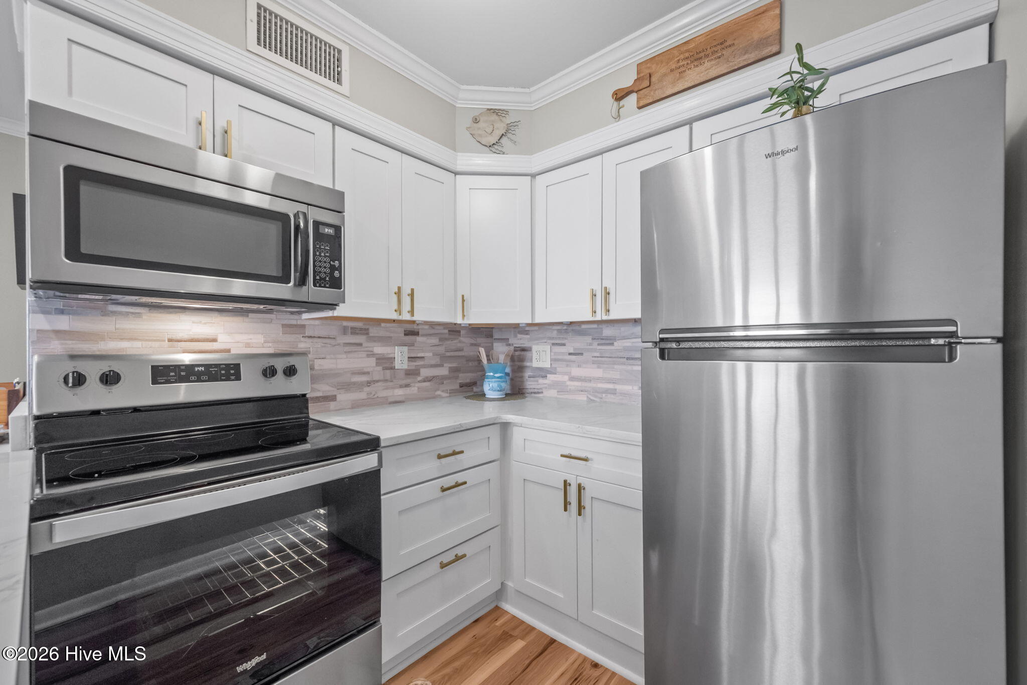 1822 New River Inlet Road, Unit 1102A North Topsail Beach, NC 28460 - Photo 14 of 51 Kitchen