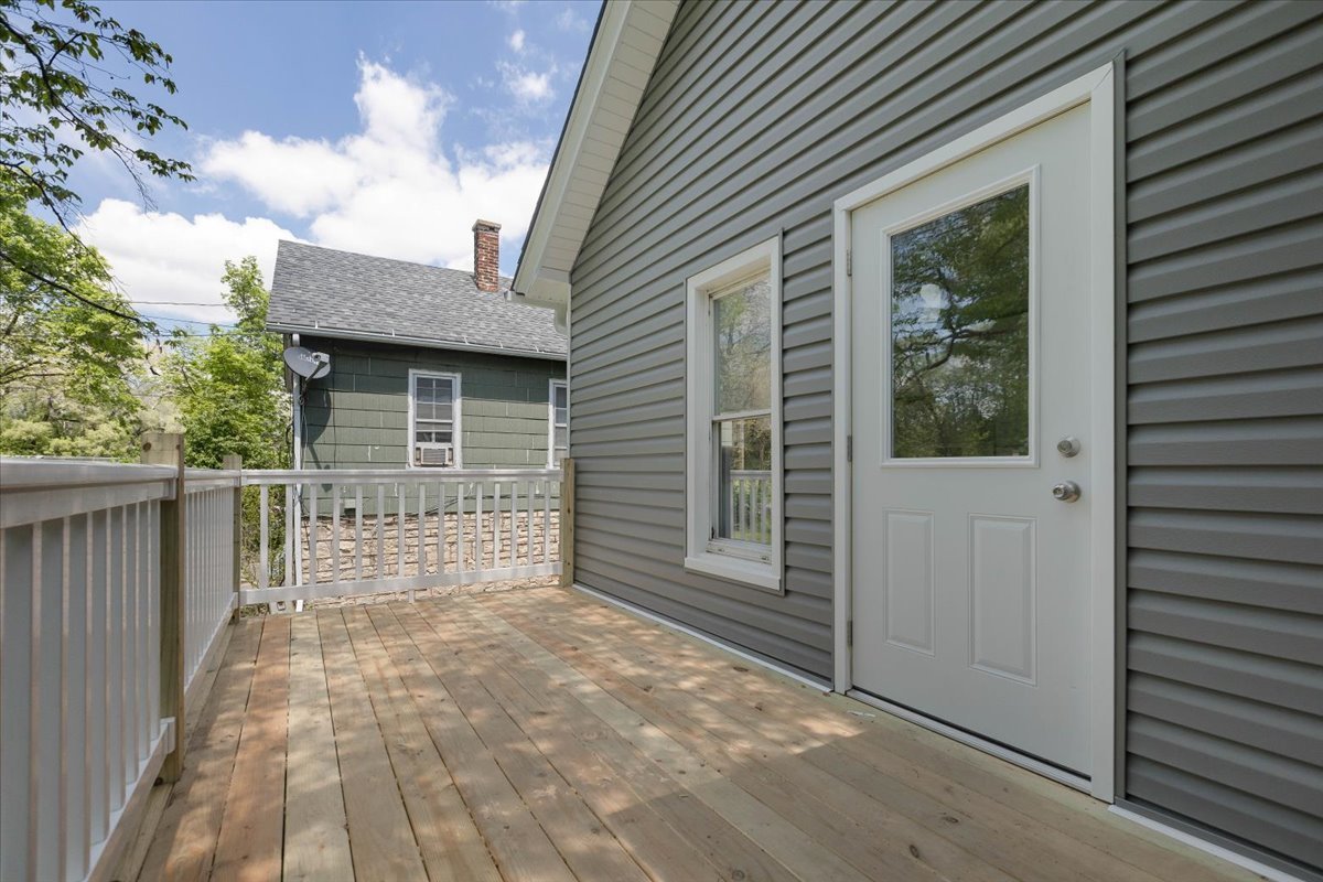 453 Water Street Joliet, IL 60436 - Photo 13 of 14 a view of backyard with a large tree