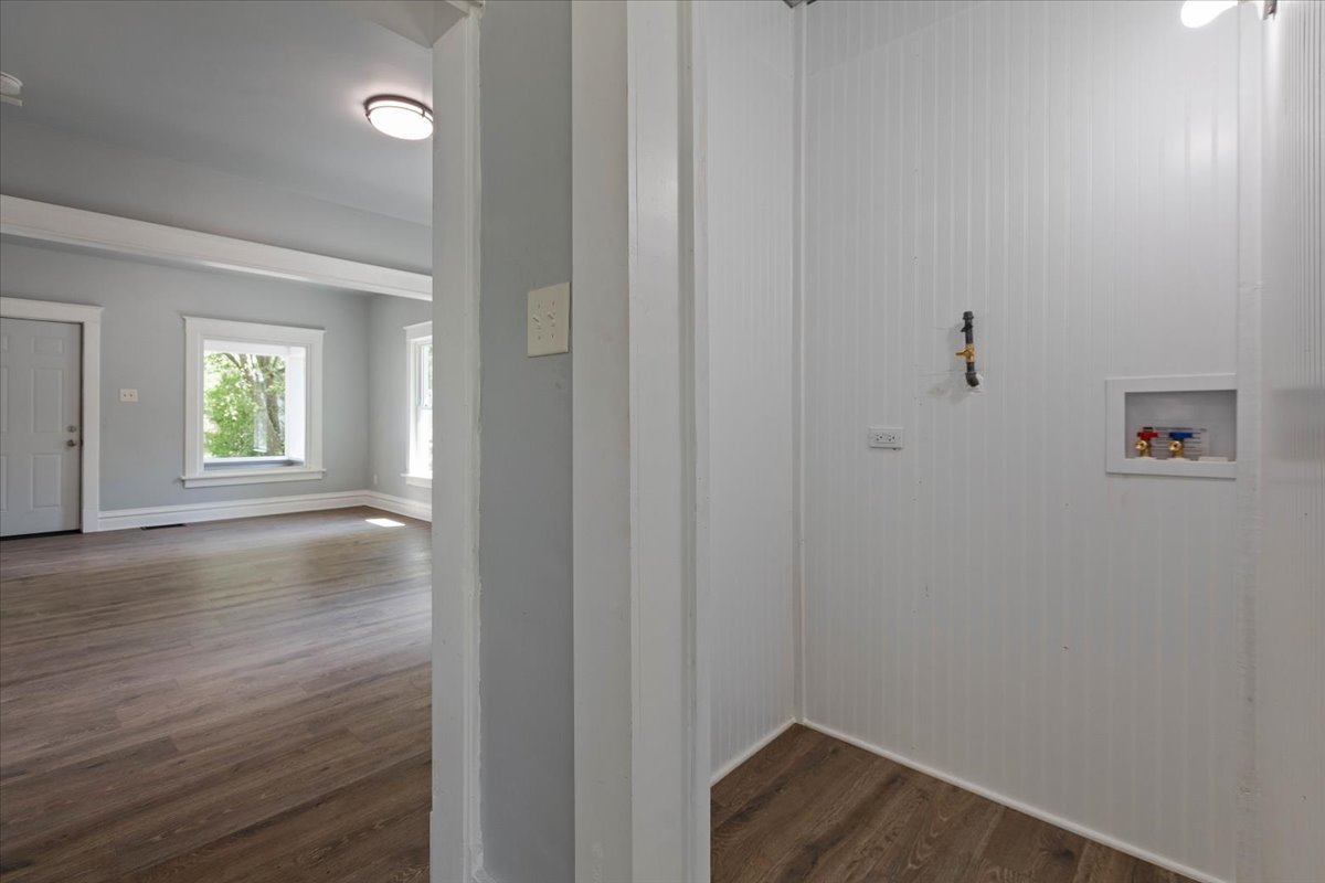 453 Water Street Joliet, IL 60436 - Photo 10 of 14 a view of empty room with wooden floor and fan