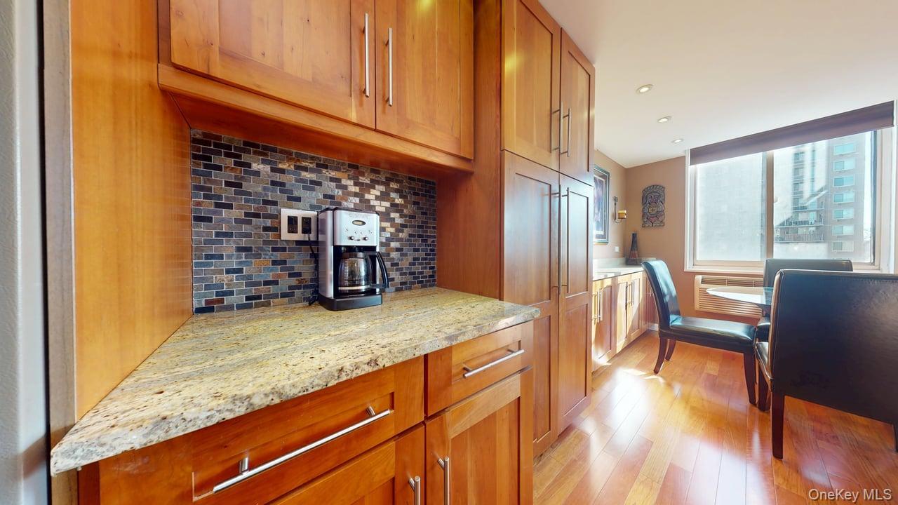 118-17 Union Turnpike, Unit 5H Queens, NY 11375 - Photo 20 of 48 a view of kitchen and dining room