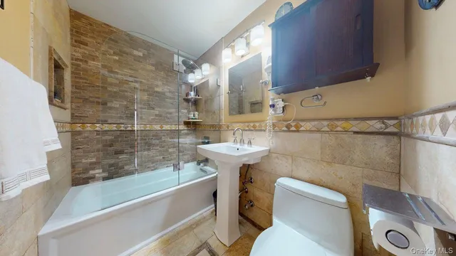a bathroom with a sink and a bathtub