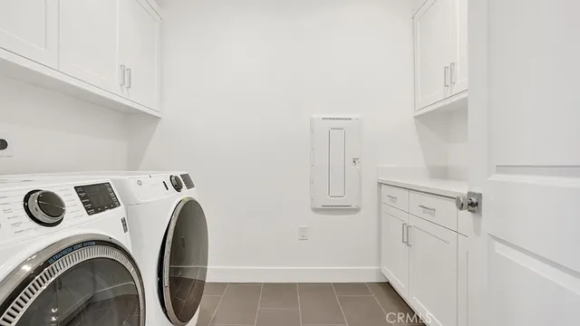 an aerial view of residential building and lake