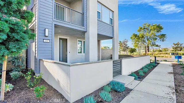 a view of a brick house with a large windows
