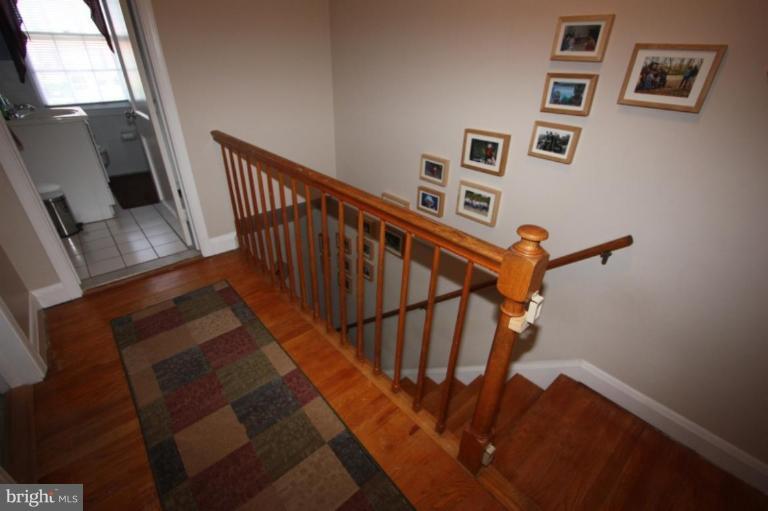 1533 Doxbury Road Towson, MD 21286 - Photo 20 of 30 Natural hardwood stairs and hallway!