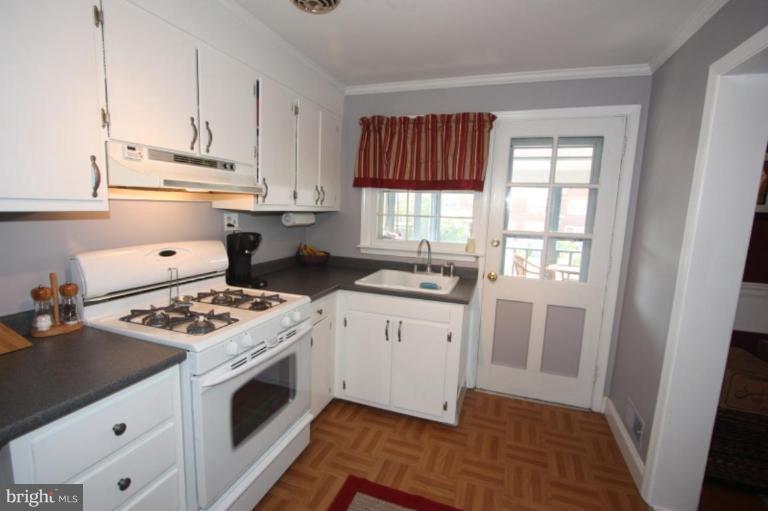 Neutral colors with window over the sink!