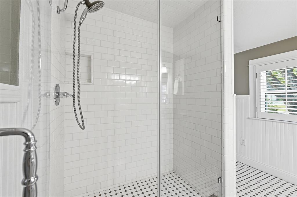 9121 6th Street Frisco, TX 75033 - Photo 16 of 27 a bathroom with a shower