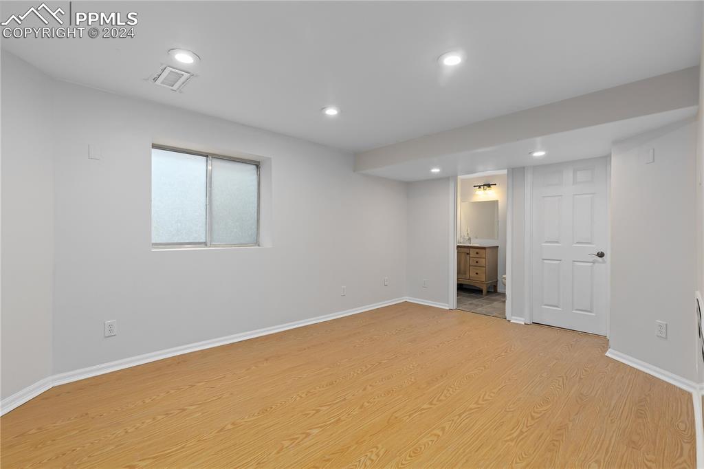 1590 Spring Water Way Highlands Ranch, CO 80129 - Photo 31 of 44 an empty room with a empty space and windows