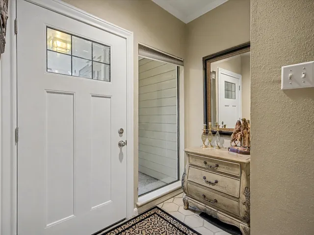 a bathroom with a bathtub a mirror and shower view