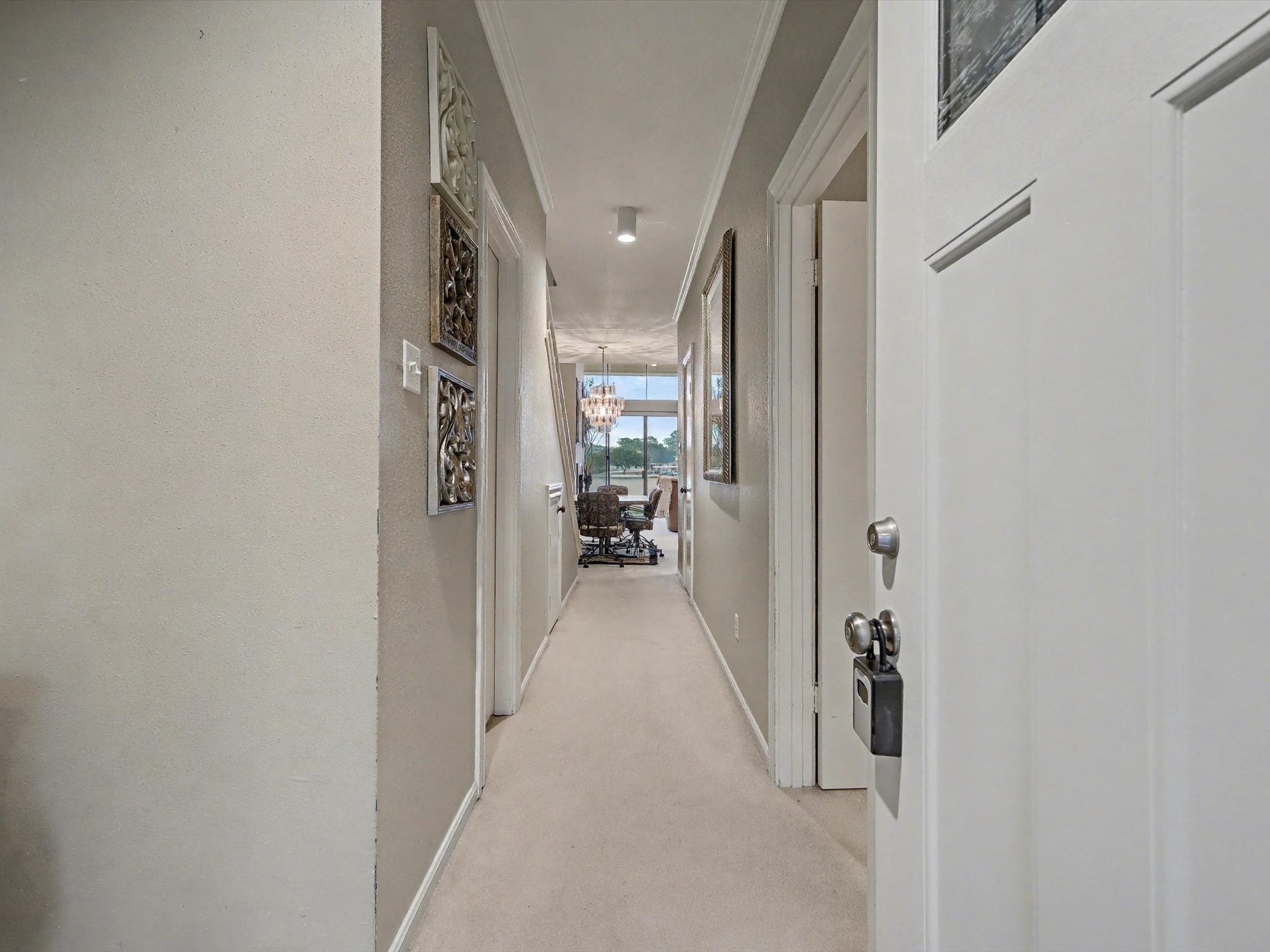 75 April Point Drive South Conroe, TX 77356 - Photo 4 of 18 a view of a hallway with a livingroom and having having tops
