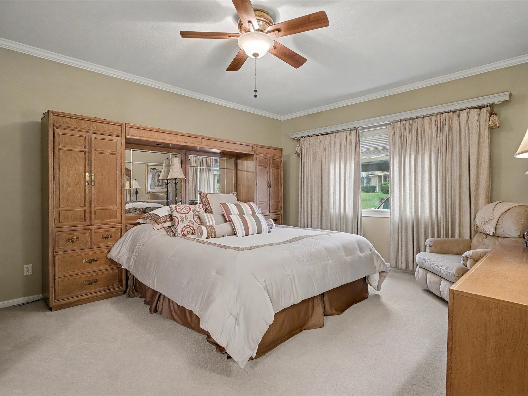 75 April Point Drive South Conroe, TX 77356 - Photo 7 of 18 a bedroom with a bed and a chandelier