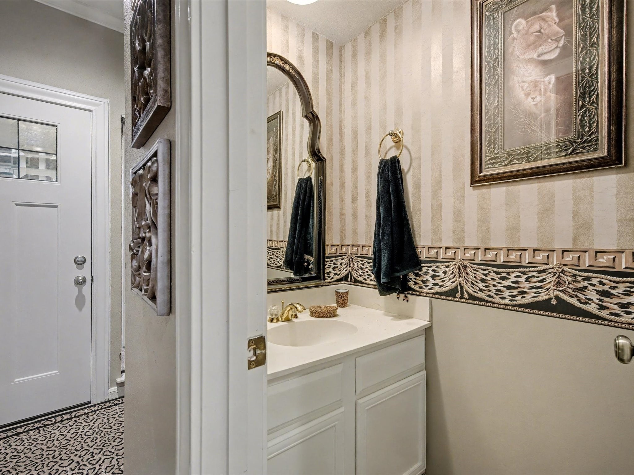 75 April Point Drive South Conroe, TX 77356 - Photo 10 of 18 a bathroom with a sink vanity and a mirror
