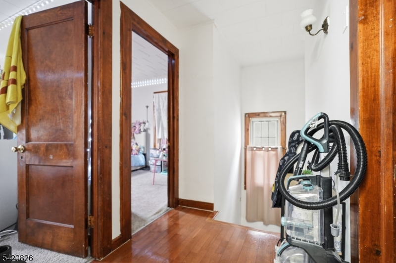 923-925 Kilsyth Road Elizabeth, NJ 07208 - Photo 16 of 24 a view of a livingroom with furniture and front door