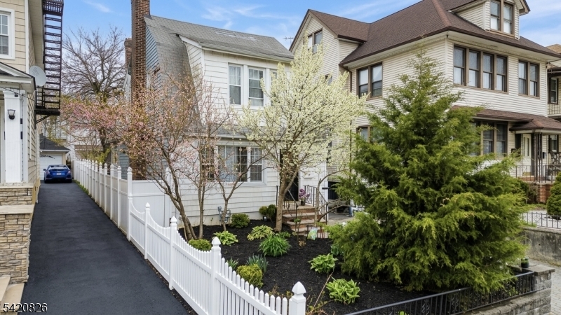 923-925 Kilsyth Road Elizabeth, NJ 07208 - Photo 2 of 24 a view of a house with brick walls