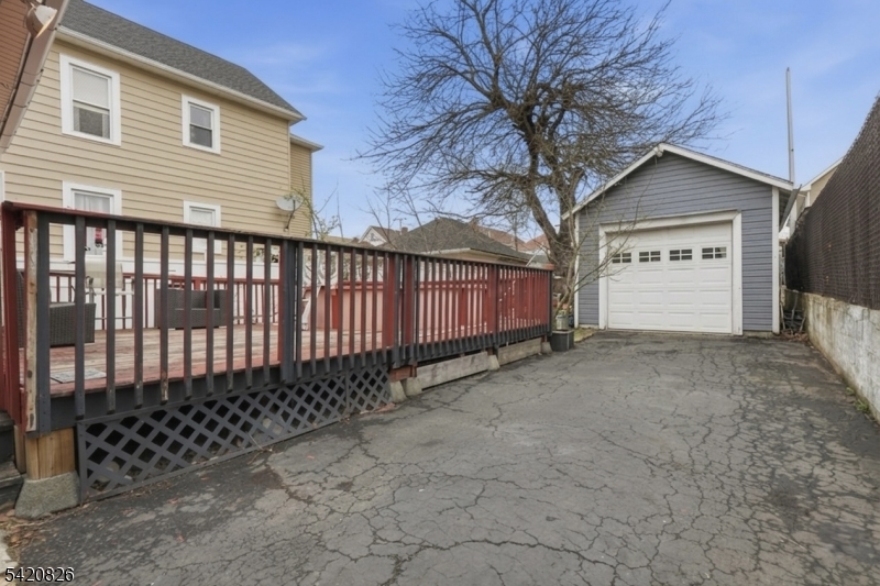 923-925 Kilsyth Road Elizabeth, NJ 07208 - Photo 21 of 24 a view of a house with a garage
