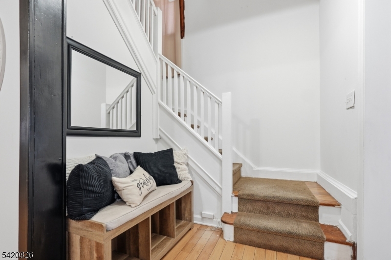 923-925 Kilsyth Road Elizabeth, NJ 07208 - Photo 6 of 24 a view of entryway and hall with wooden floor