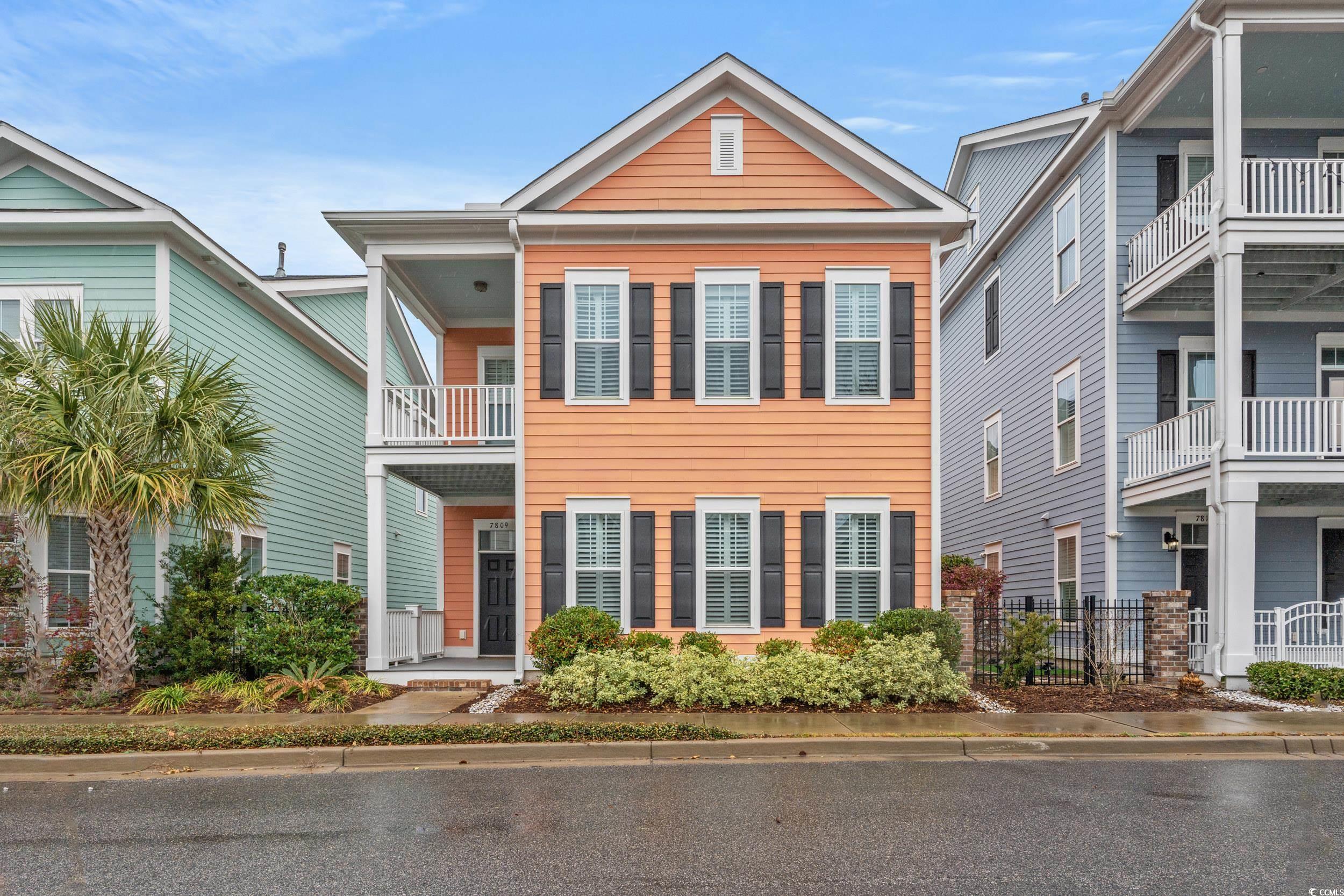 7809 Monarch Drive Myrtle Beach, SC 29572 - Photo 1 of 33 View of front of house featuring a balcony
