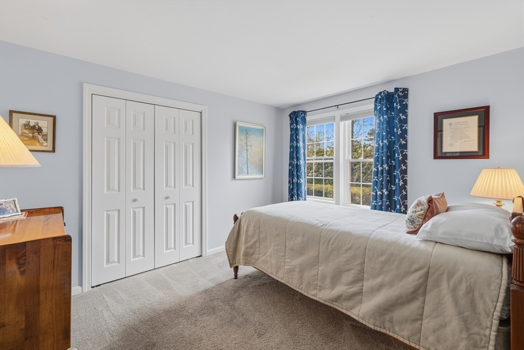 1 Susan Carsley Way Sandwich, MA 02563 - Photo 12 of 39 a bedroom with a bed and a window