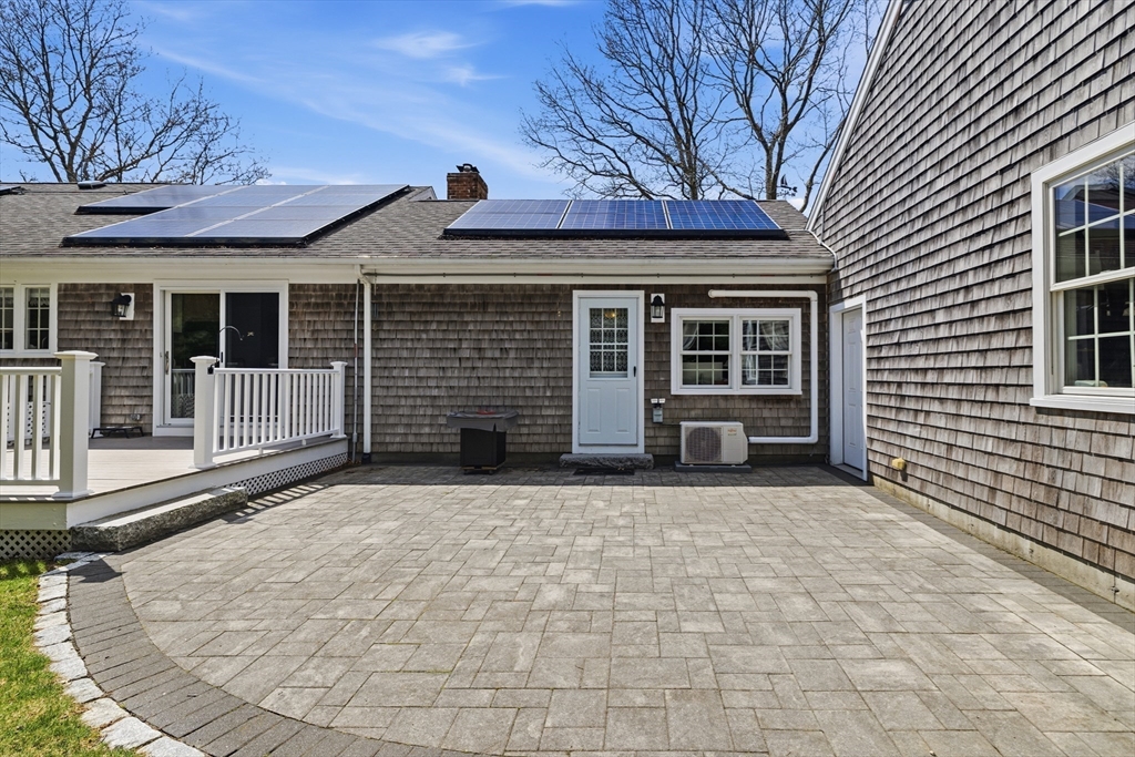 1 Susan Carsley Way Sandwich, MA 02563 - Photo 21 of 39 a front view of a house with a garage
