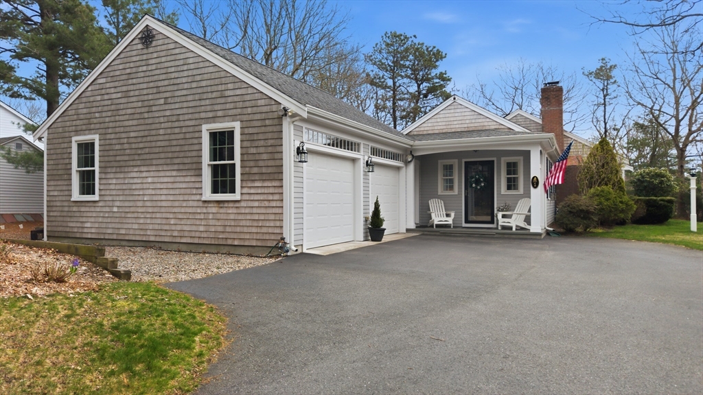1 Susan Carsley Way Sandwich, MA 02563 - Photo 25 of 39 a view of a house with a garage