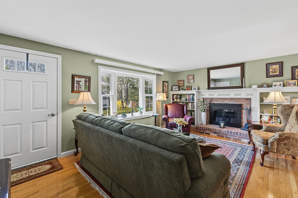 1 Susan Carsley Way Sandwich, MA 02563 - Photo 36 of 39 a living room with furniture and a fireplace