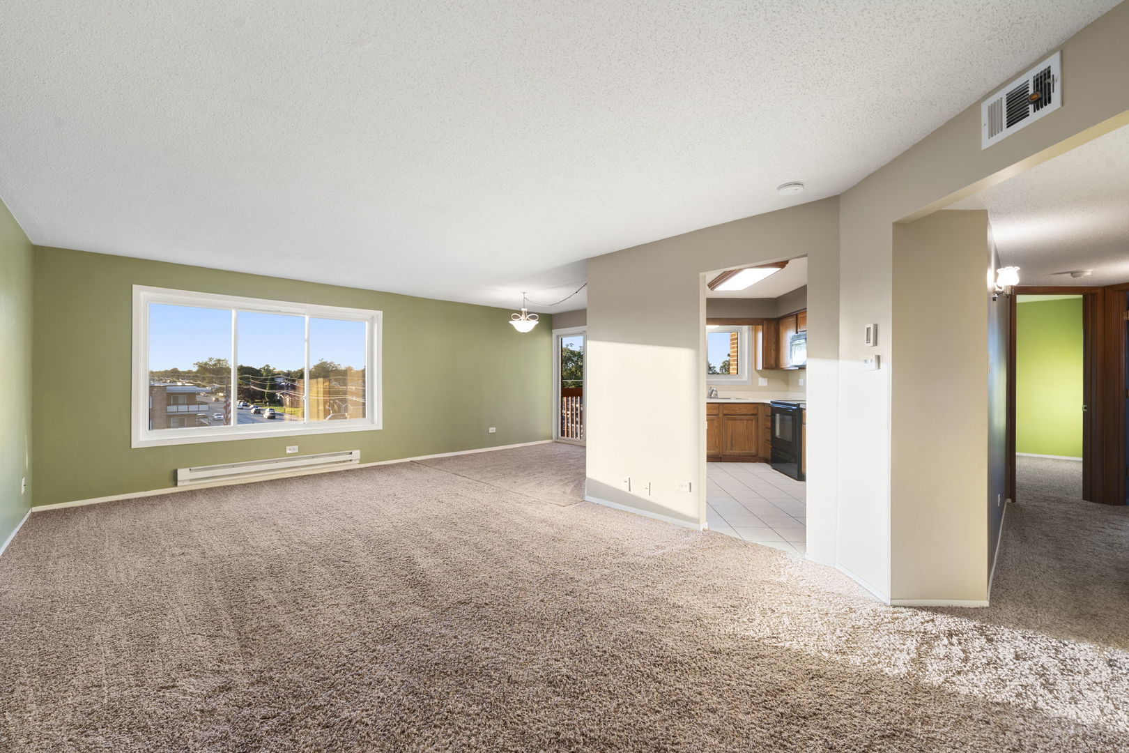 6421 Pershing Road, Unit 404 Berwyn, IL 60402 - Photo 3 of 31 a view of an empty room with a window