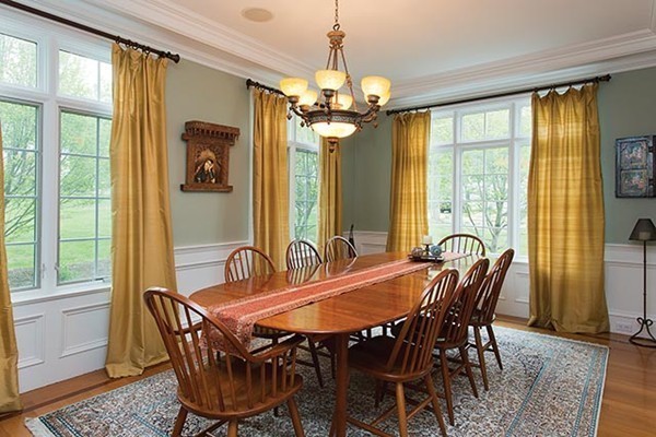 21 Clifton Road Newton, MA 02459 - Photo 3 of 22 a dining room with furniture a chandelier and window