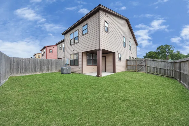 a view of a backyard with a garden