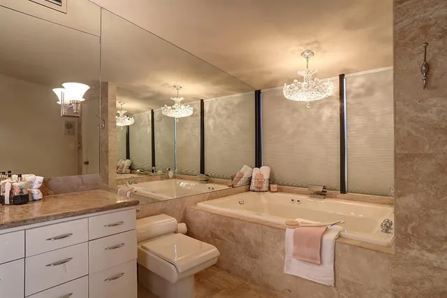 a bathroom with a sink a counter and a mirror