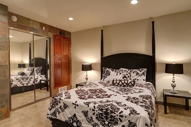a spacious bathroom with a tub and shower