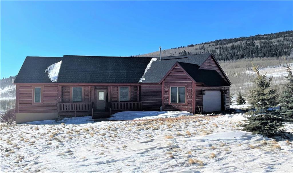 114 Round Hill Road Fairplay, CO 80440 - Photo 1 of 35 a front view of a house with a yard
