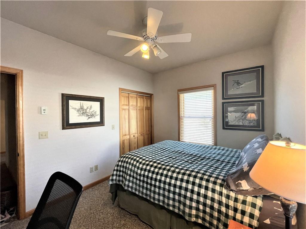 114 Round Hill Road Fairplay, CO 80440 - Photo 21 of 35 a bedroom with a bed and a window