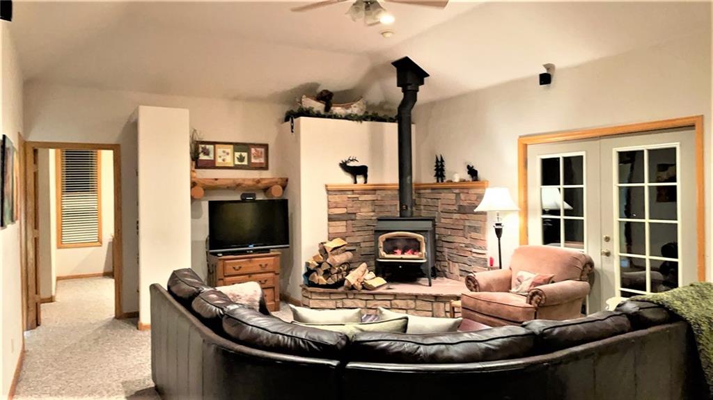 114 Round Hill Road Fairplay, CO 80440 - Photo 8 of 35 a living room with furniture and a fireplace