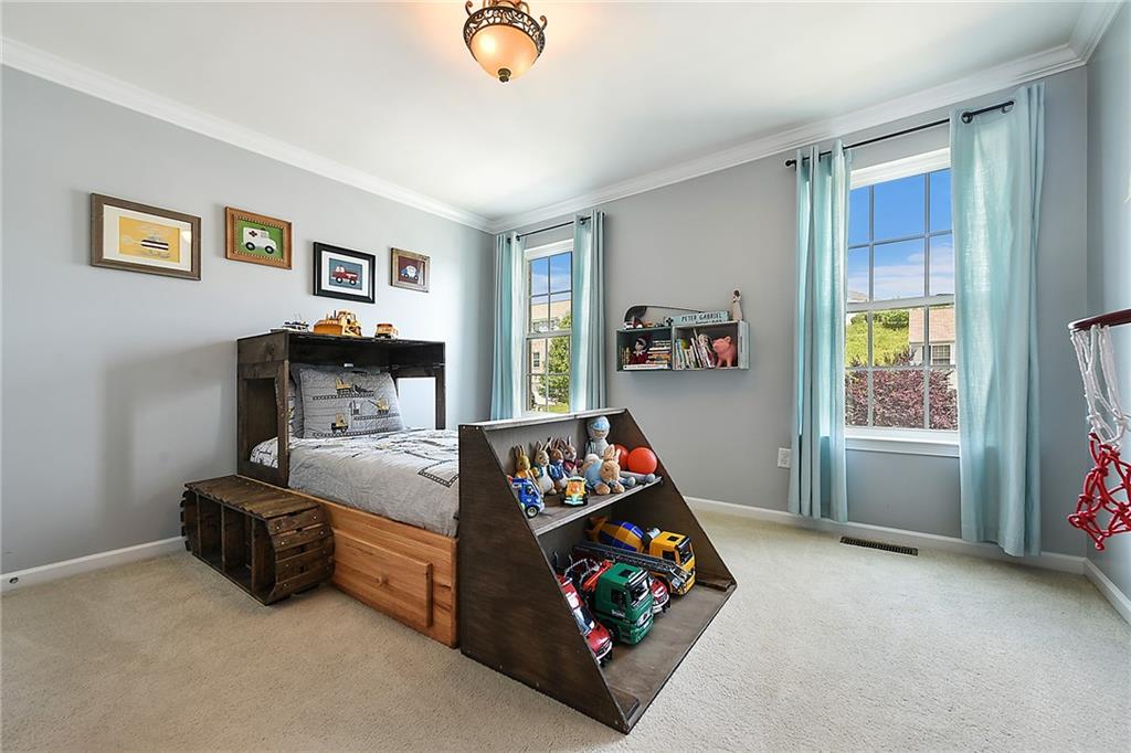 179 Broadstone Drive Mars, PA 16046 - Photo 18 of 25 a bedroom with furniture and a window