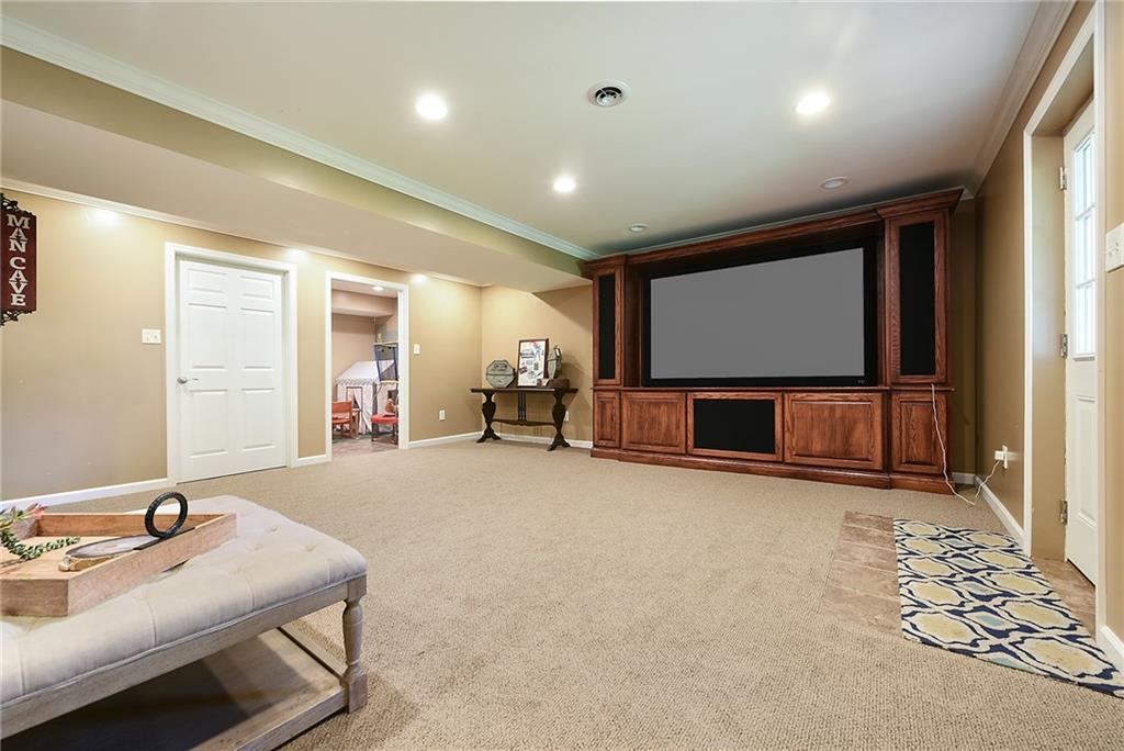 179 Broadstone Drive Mars, PA 16046 - Photo 21 of 25 a room with furniture and a flat screen tv